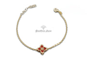 Bracciale con Fiore Rosso in Oro 18 kt